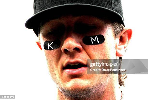 Shortstop Troy Tulowitzki of the Colorado Rockies wears the initials KM on his eye black in honor of Keli McGregor as the Rockies host the Florida...