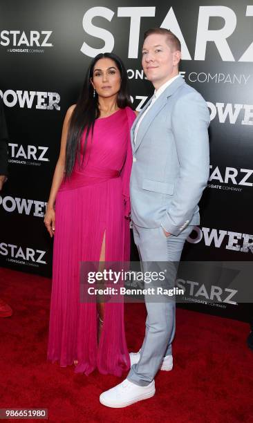 Actors Lela Loren and Joseph Sikora pose for a picture during the "Power" Season 5 premiere at Radio City Music Hall on June 28, 2018 in New York...