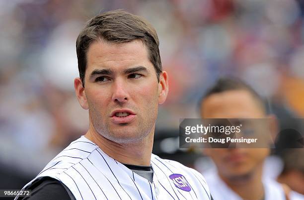 Seth Smith of the Colorado Rockies looks on from the dugout against the Florida Marlins at Coors Field on April 25, 2010 in Denver, Colorado. Smith...