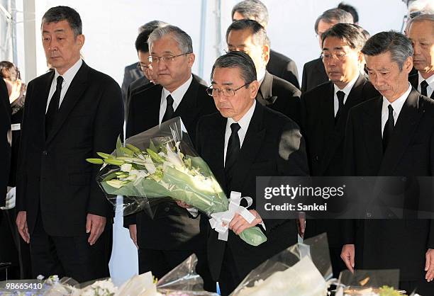 West Japan Railway Co. President Takayuki Sasaki offeres a flower bunch during a ceremony to mark the 5th anniversary of the train derailment which...