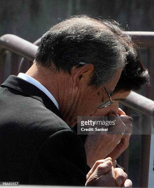 Man prays for the victims during a ceremony to mark the 5th anniversary of the train derailment which killed 107 people in 2005, on April 25, 2010 in...