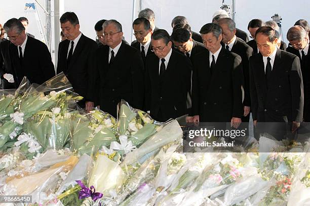 Officials of West Japan Railway Co. , including its President Takayuki Sasaki pray for the victims during a ceremony to mark the 5th anniversary of...