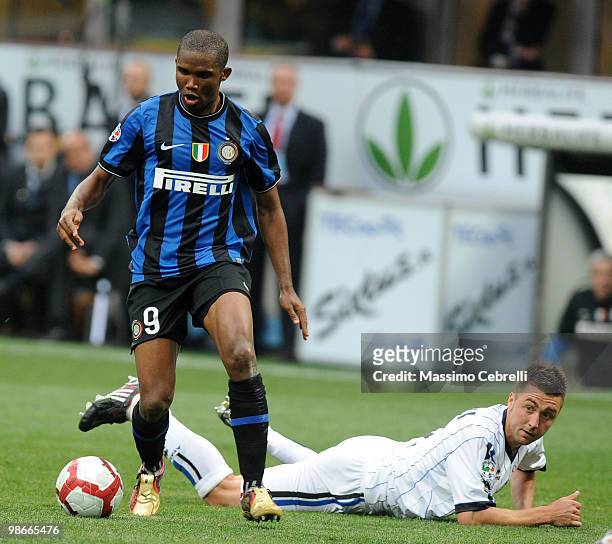 Samuel Eto'o Fils of FC Internazionale Milano controls the ball while Daniele Capelli of Atalanta BC loooks on during the Serie A match between FC...