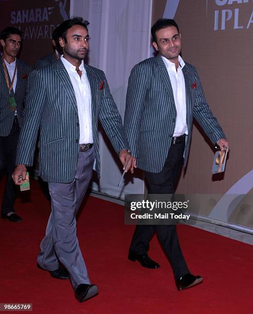 Amit Mishra and Virender Sehwag arrives for the IPL Awards night in Mumbai on April 23, 2010.