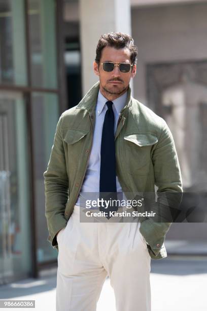 Model David Gandy wears a Thom Sweeney shirt, Emma Willis tie, Private White V.C jacket and trousers and Aerodrome by David Gandy for Aspinal of...
