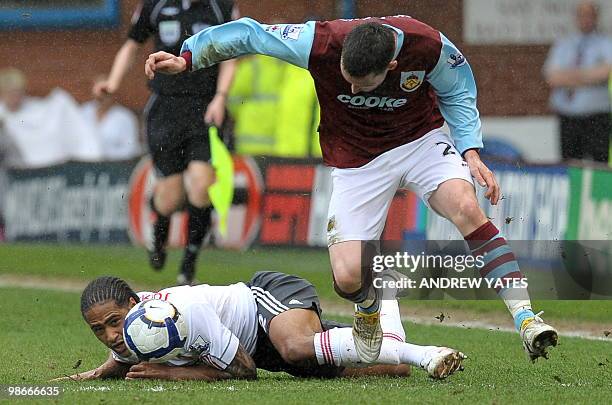 Liverpool's English defender Glen Johnson vies with Burnley's English striker David Nugent during the English Premier League football match between...