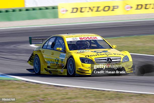 Mercedes driver David Coulthard of Scotland steers his car during the race of the DTM 2010 German Touring Car Championship on April 25, 2010 in...