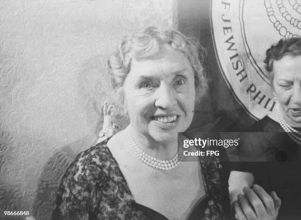 American writer, educator and advocate for the disabled Helen Keller , at a reception in New York, where she was named 'Woman of the Years' by the...