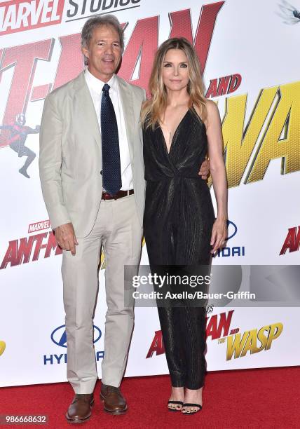 Actress Michelle Pfeiffer and husband David E. Kelley attend the premiere of Disney and Marvel's 'Ant-Man and the Wasp' at El Capitan Theatre on June...