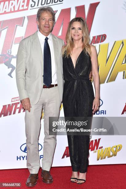 Actress Michelle Pfeiffer and husband David E. Kelley attend the premiere of Disney and Marvel's 'Ant-Man and the Wasp' at El Capitan Theatre on June...