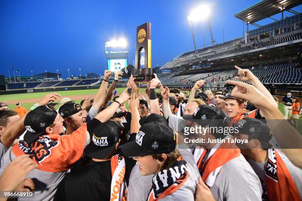 Oregon State hoists the national championship trophy following game 3 of the Division I Men's Baseball Championship held at TD Ameritrade Park on...