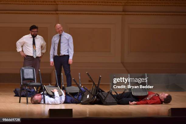 Horatio Sanz, Matt Walsh, Ian Roberts and Matt Besser perform onstage during ASSSSCAT with the Upright Citizens Brigade Live at Carnegie Hall...
