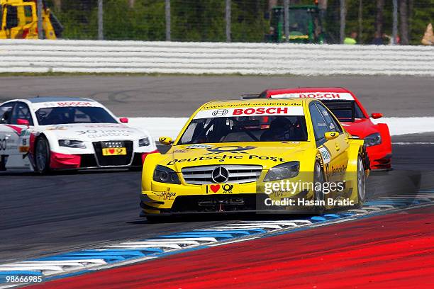 Mercedes driver David Coulthard of Scotland steers his car during the race of the DTM 2010 German Touring Car Championship on April 25, 2010 in...