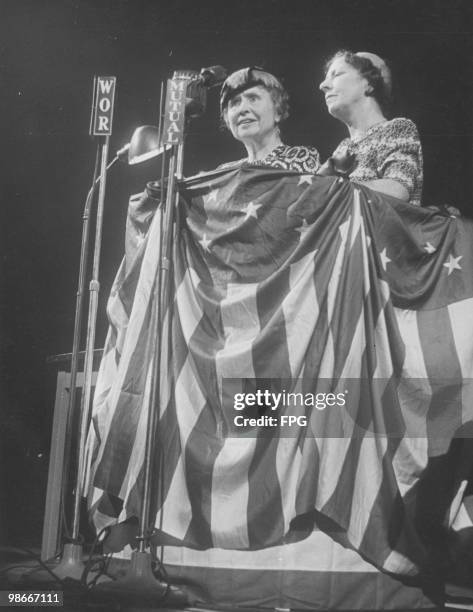 American writer, educator and advocate for the disabled Helen Keller at a rally in support of American politician Henry A. Wallace, circa 1946. She...