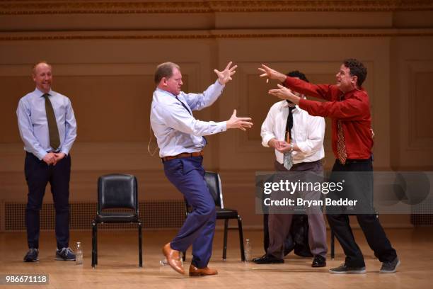 Matt Walsh, Ian Roberts, Horatio Sanz and Matt Besser perform onstage during ASSSSCAT with the Upright Citizens Brigade Live at Carnegie Hall...