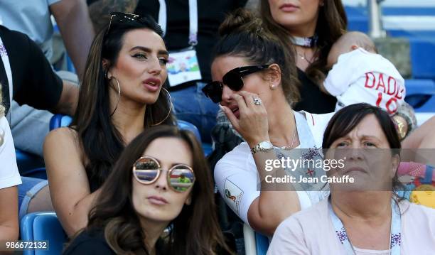 Annie Kilner, girlfriend of Kyle Walker of England, Rebekah Vardy, wife of Jamie Vardy during the 2018 FIFA World Cup Russia group G match between...