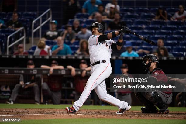 Starlin Castro of the Miami Marlins hits a home run during the game against the Arizona Diamondbacks at Marlins Park on June 27, 2018 in Miami,...