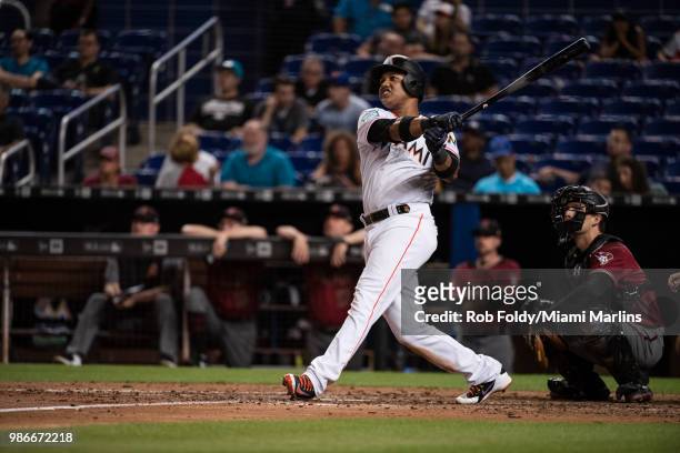 Starlin Castro of the Miami Marlins hits a home run during the game against the Arizona Diamondbacks at Marlins Park on June 27, 2018 in Miami,...