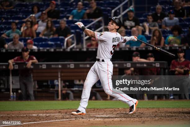 Derek Dietrich of the Miami Marlins at bat during the game against the Arizona Diamondbacks at Marlins Park on June 27, 2018 in Miami, Florida.