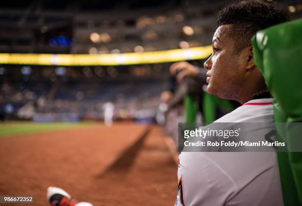 Starlin Castro of the Miami Marlins looks on from the dugout during the game against the Arizona Diamondbacks at Marlins Park on June 26, 2018 in...