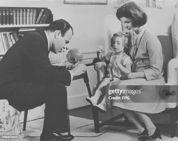 United States First Lady Jacqueline Kennedy , wife of President John F. Kennedy, with her daughter Caroline during an interview with NBC...