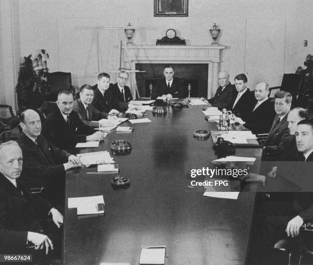 President John F. Kennedy and his cabinet at the White House, Washington DC, 1961. Clockwise, from left: Postmaster General J. Edward Day, Ambassador...