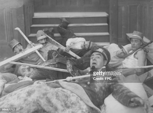 Police Chief Teeheezel, played by American actor Ford Sterling in a chaotic scene from one of Mack Sennett's 'Keystone Kops' series of silent film...
