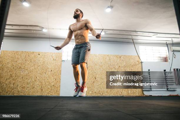 Man Using Jump Rope Model 2,239 Man Jumping Rope Stock Photos, High-Res Pictures, and Images ...