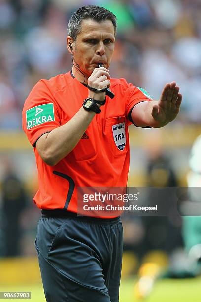 Referee Michael Weiner pipes during the Bundesliga match between Borussia Moenchengladbach and FC Bayern Muenchen at Borussia Park on April 24, 2010...