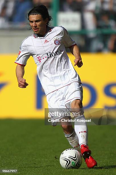 Daniel Pranjic of Bayern runs with the ball during the Bundesliga match between Borussia Moenchengladbach and FC Bayern Muenchen at Borussia Park on...