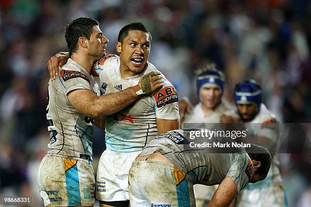 Mark Minichiello and Clinton Toopi celebrate winning the round seven NRL match between the Manly Sea Eagles and the Gold Coast Titans at Brookvale...