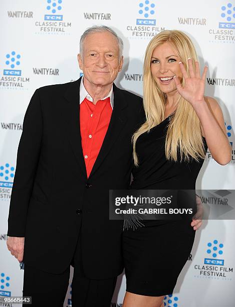 Playboy owner Hugh Hefner arrives with Playmate and actress Crystal Harris at the world premiere of the restored "A Star is born" during the opening...