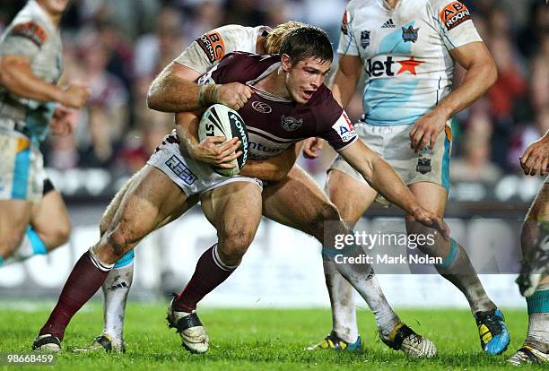 Matt Balin of the Eagles is tackled during the round seven NRL match between the Manly Sea Eagles and the Gold Coast Titans at Brookvale Oval on...