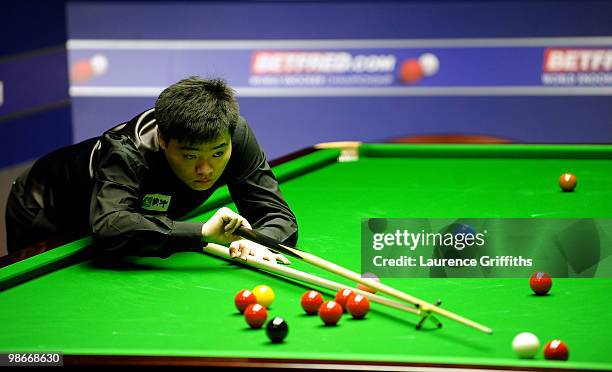 Ding Junhui in action in his match against Shaun Murphy during the Betfred.com World Snooker Championships at the Crucible Theatre on April 26, 2010...