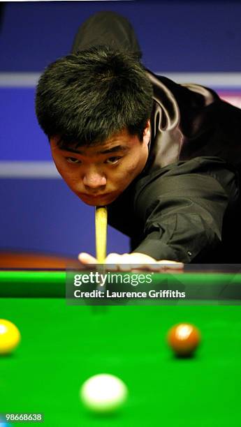 Ding Junhui in action in his match against Shaun Murphy during the Betfred.com World Snooker Championships at the Crucible Theatre on April 26, 2010...