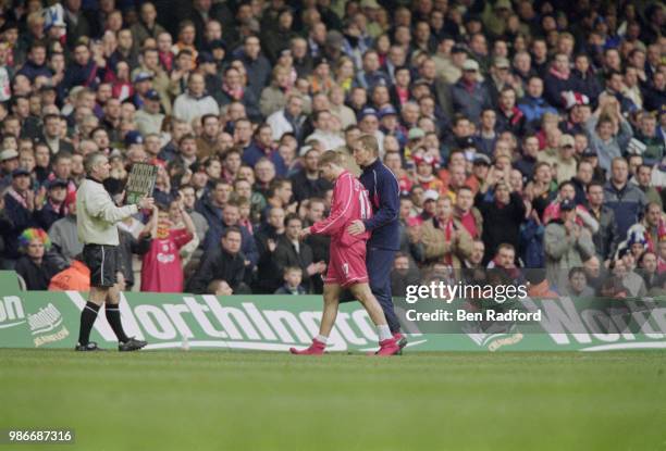 English footballer Steven Gerrard of Liverpool, leaves the field after an injury during the Football League Cup Final against Birmingham City at the...