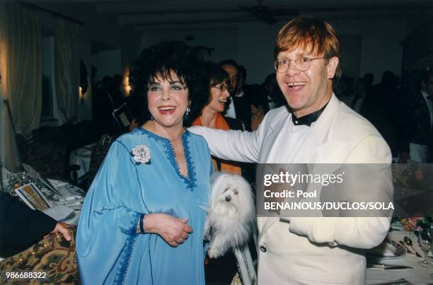 Elizabeth Taylor et Elton John au Moulin de Mougins pour une soirée AMFAR la 16 mai 1996 en France.