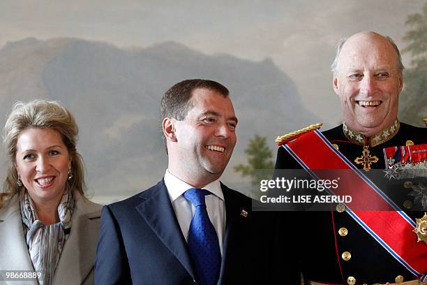 Norwegian King Harald , Russian President Dmitry Medvedev and his wife Svetlana Medvedeva pose for a photography during a welcome ceremony upon their...