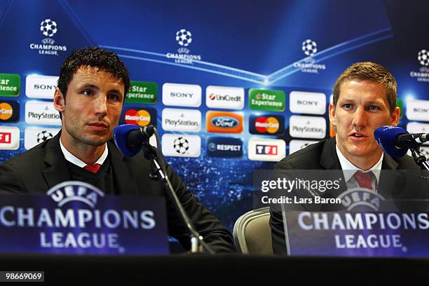 Bastian Schweinsteiger speaks next to team mate Mark van Bommel during a Bayern Muenchen press conference on April 26, 2010 in Lyon, France. Muenchen...