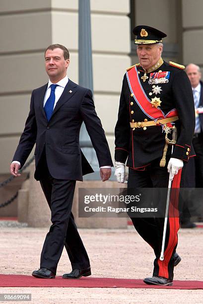 Russian President Dmitry Medvedev and King Harald V of Norway arrive at Palace Square on a state visit to Norway on April 26, 2010 in Oslo, Norway.