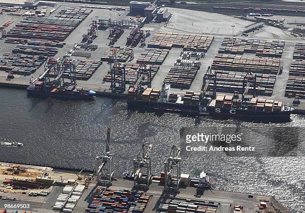 This aerial view shows hundreds of containers stored at the EUROKAI KGaA and HHLA container terminal at the Hamburg harbour on April 24, 2010 in...