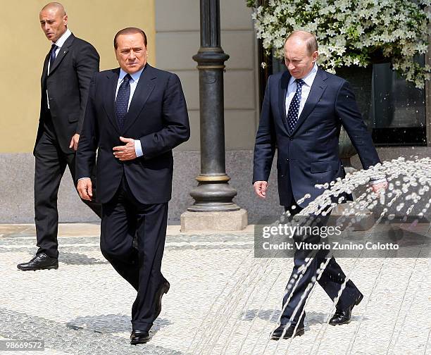 Italian Prime Minister Silvio Berlusconi and Russian Prime Minister Vladimir Putin arrive at the Bilateral Meeting held at Villa Gernetto on April...