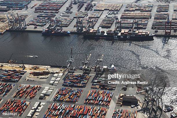 This aerial view shows hundreds of containers stored at the EUROKAI KGaA and HHLA container terminal at the Hamburg harbour on April 24, 2010 in...