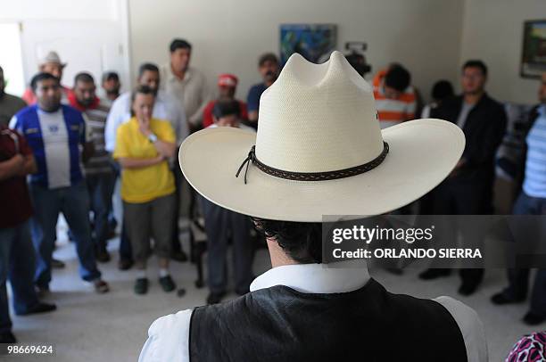 Ousted Honduran President Manuel Zelaya takes part in a religious ceremony with supporters held at the Brazilian embassy in Tegucigalpa September 28,...