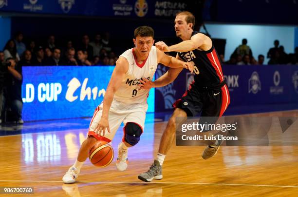 Alex Caruso of Mexico plays the ball against Francisco Cruz of USA during the match between Mexico and USA as part of the FIBA World Cup China 2019...