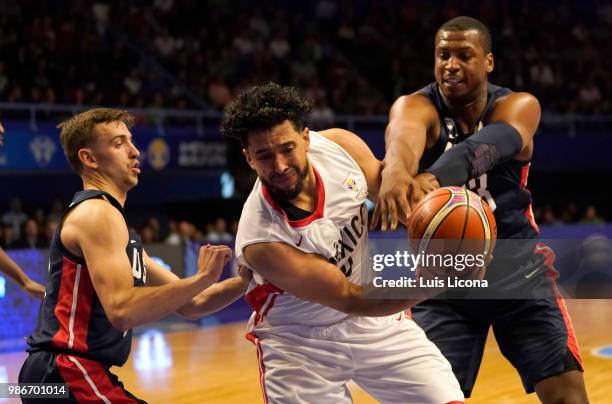 Gabriel Giron of Mexico competes against Jonathan Holmes of USA during the match between Mexico and USA as part of the FIBA World Cup China 2019...