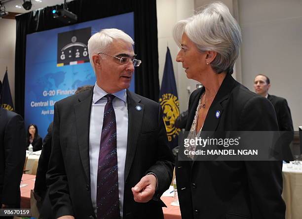 Britain's Chancellor of the Exchequer Alistair Darling chats with France's Finance Minister Christine Lagarde before a meeting of G-20 Finance...