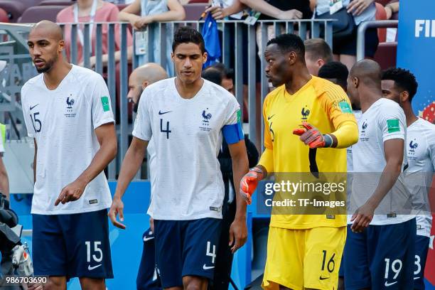 Raphael Varane of France speaks with Goalkeeper Steve Mandanda of France during the 2018 FIFA World Cup Russia group C match between Denmark and...