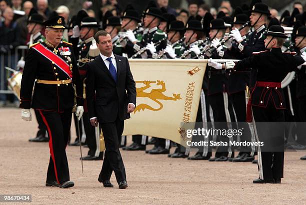 Russian President Dmitry Medvedev and King Harald V of Norway attends the official welcome ceremony for the Medevedevs outside the Royal Castle on...