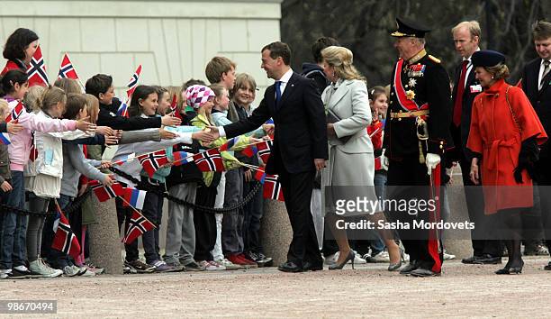 Russian President Dmitry Medvedev, his wife Svetlana Medvedeva, King Harald V of Norway and Queen Sonja of Norway attend the official welcome...